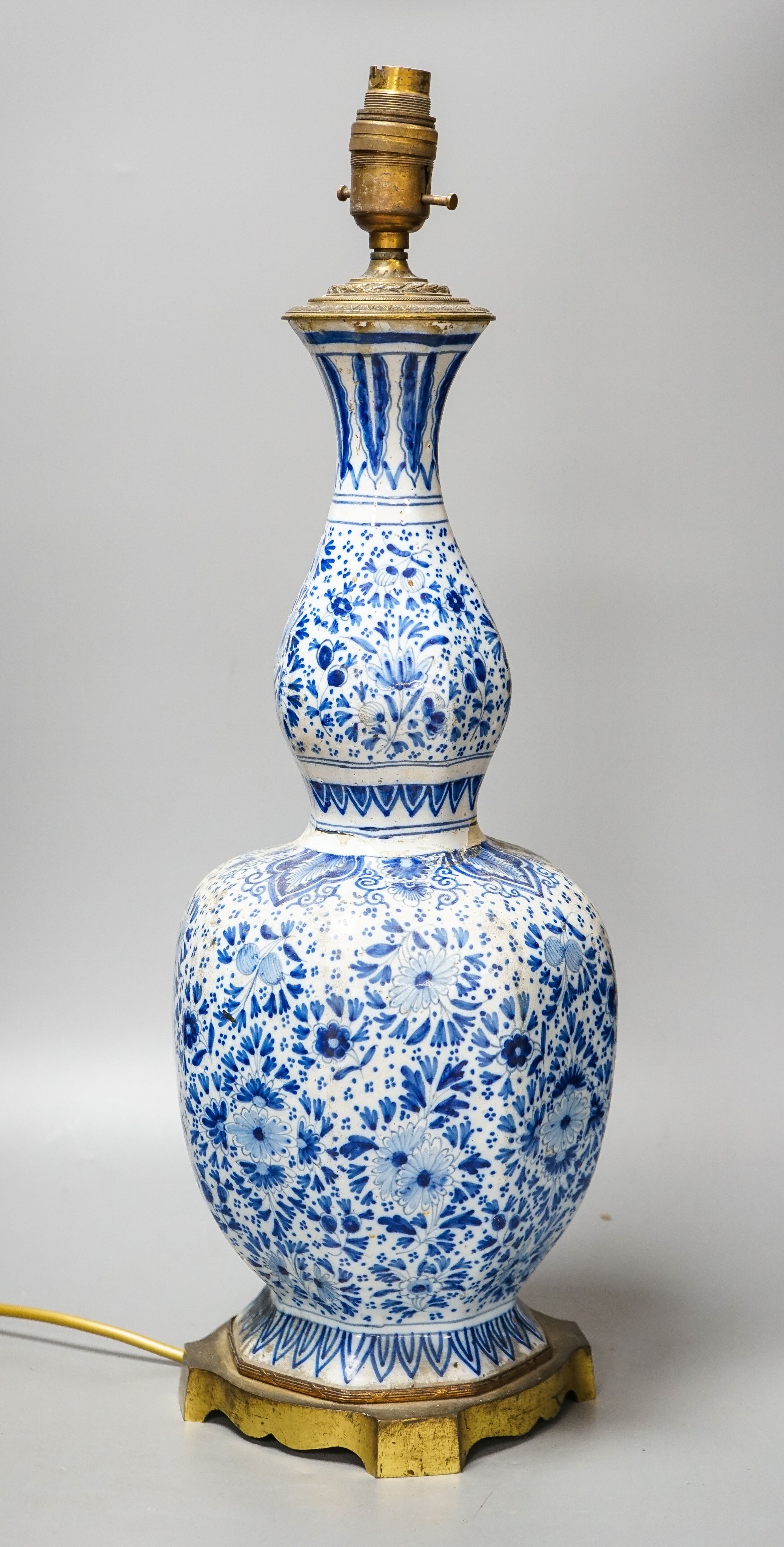 An 18th/19th century Delft blue and white octagonal double gourd vase, mounted as a lamp 50 cm